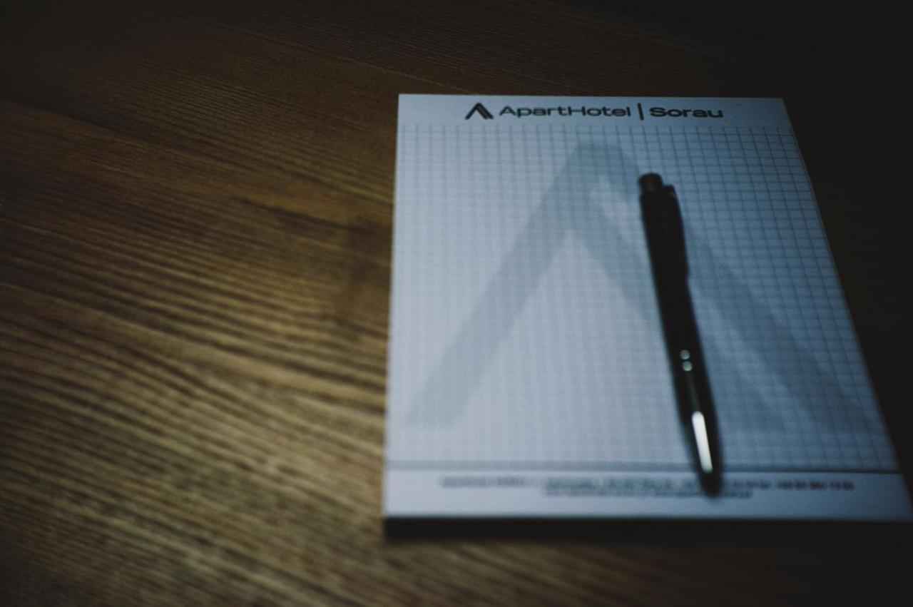 Apartsuites I Sorau Zary  Exterior photo A pen and a notepad