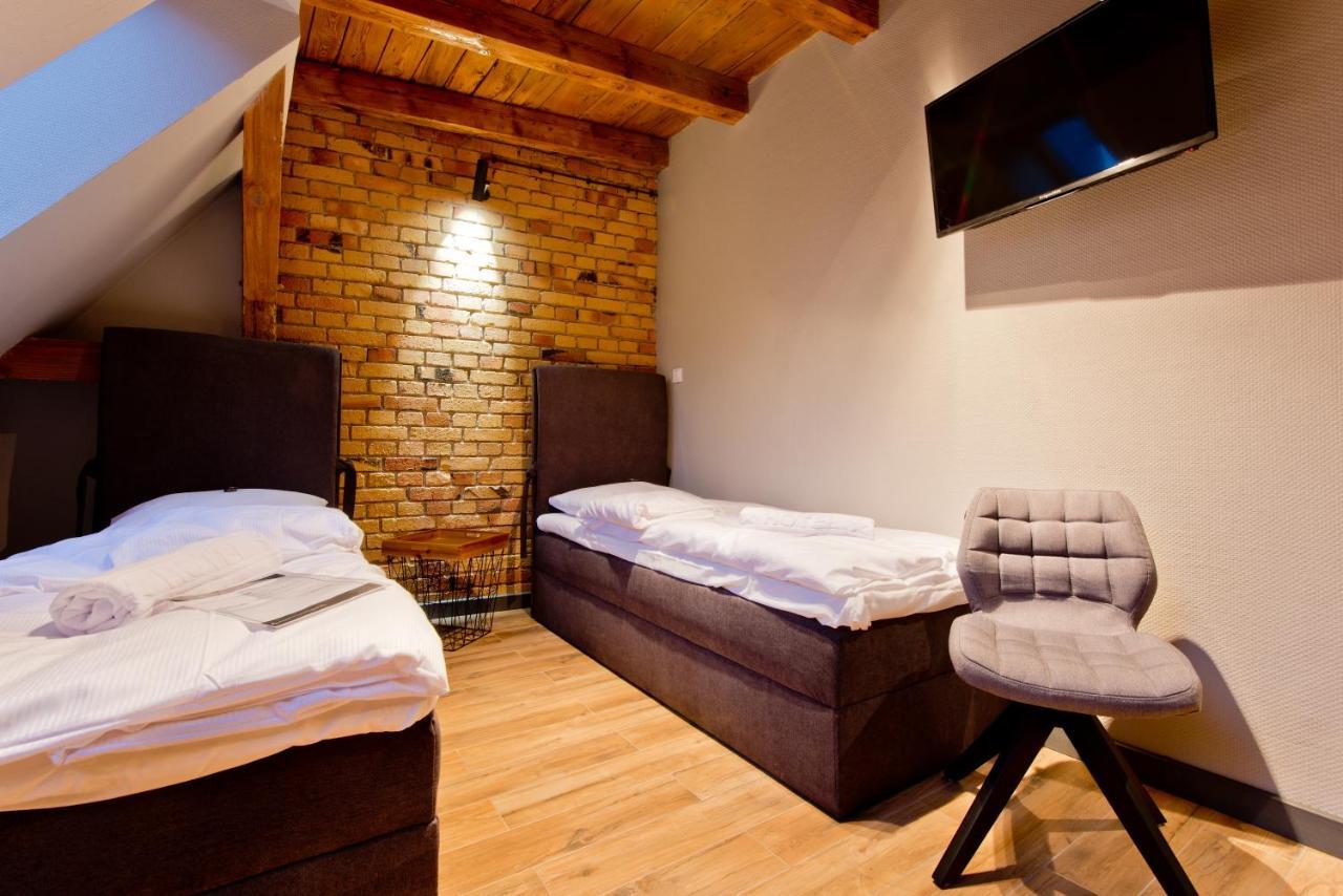Apartsuites I Sorau Zary  Exterior photo A room at the hotel